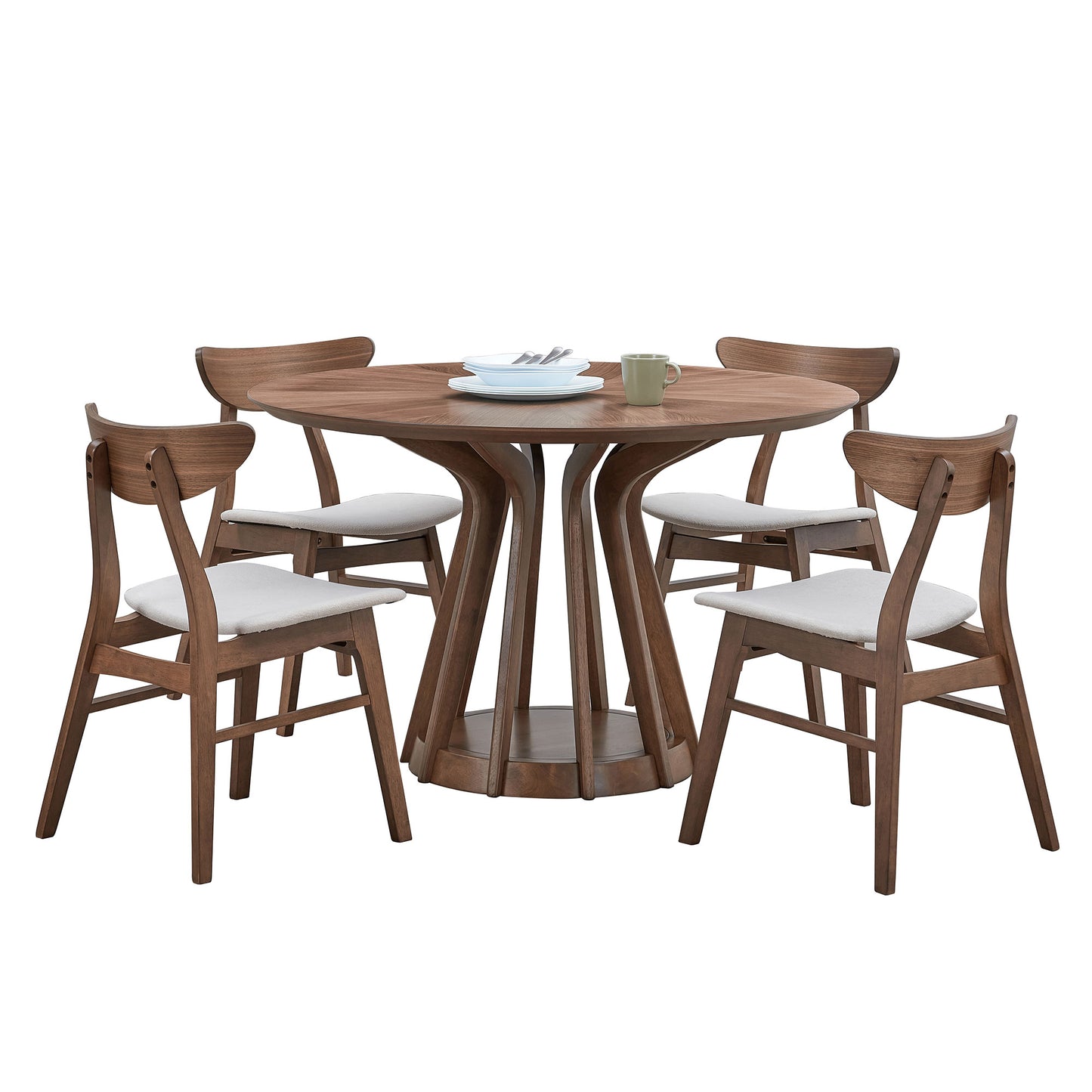 Round walnut dining table with four chairs