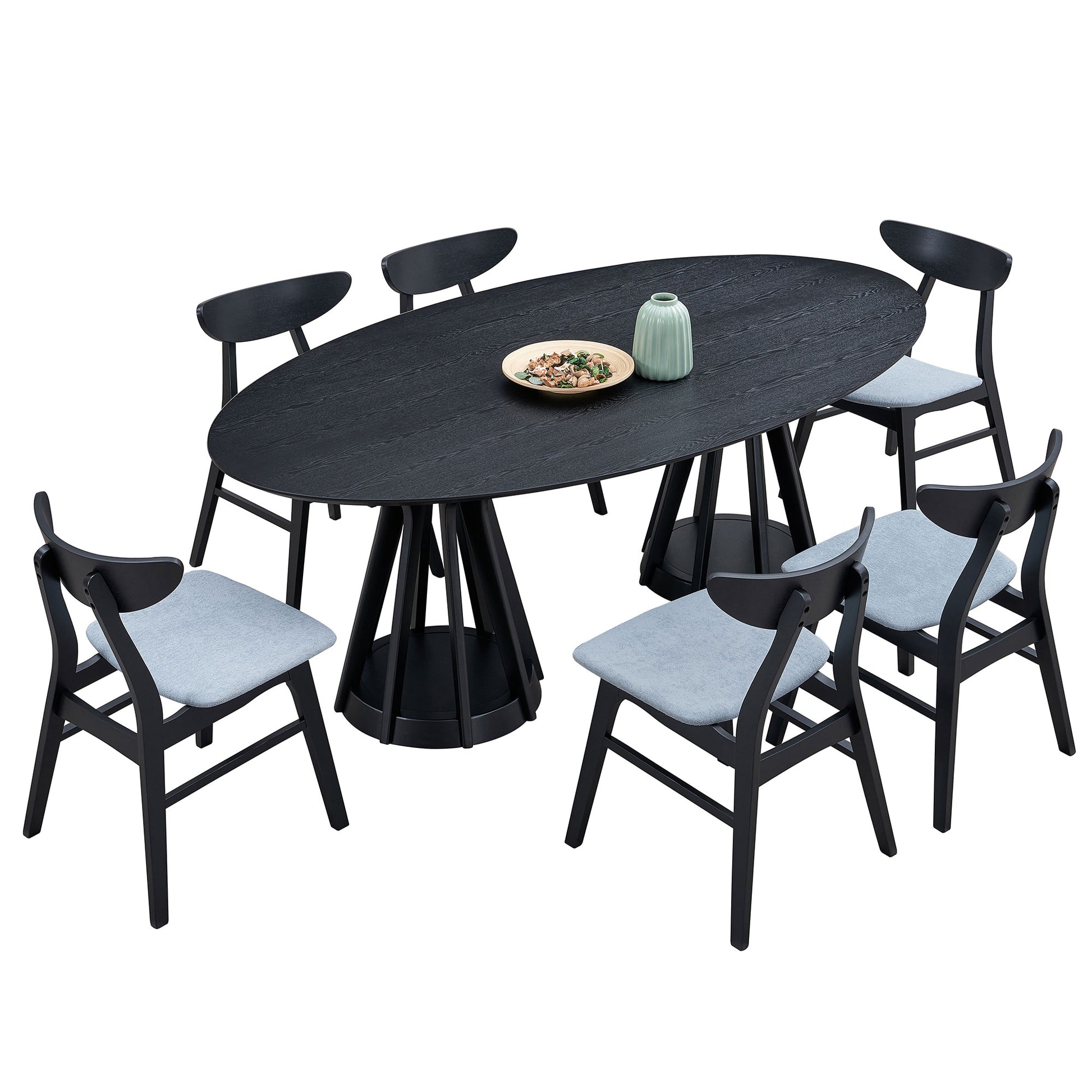 Black oval dining table with six light grey upholstered chairs