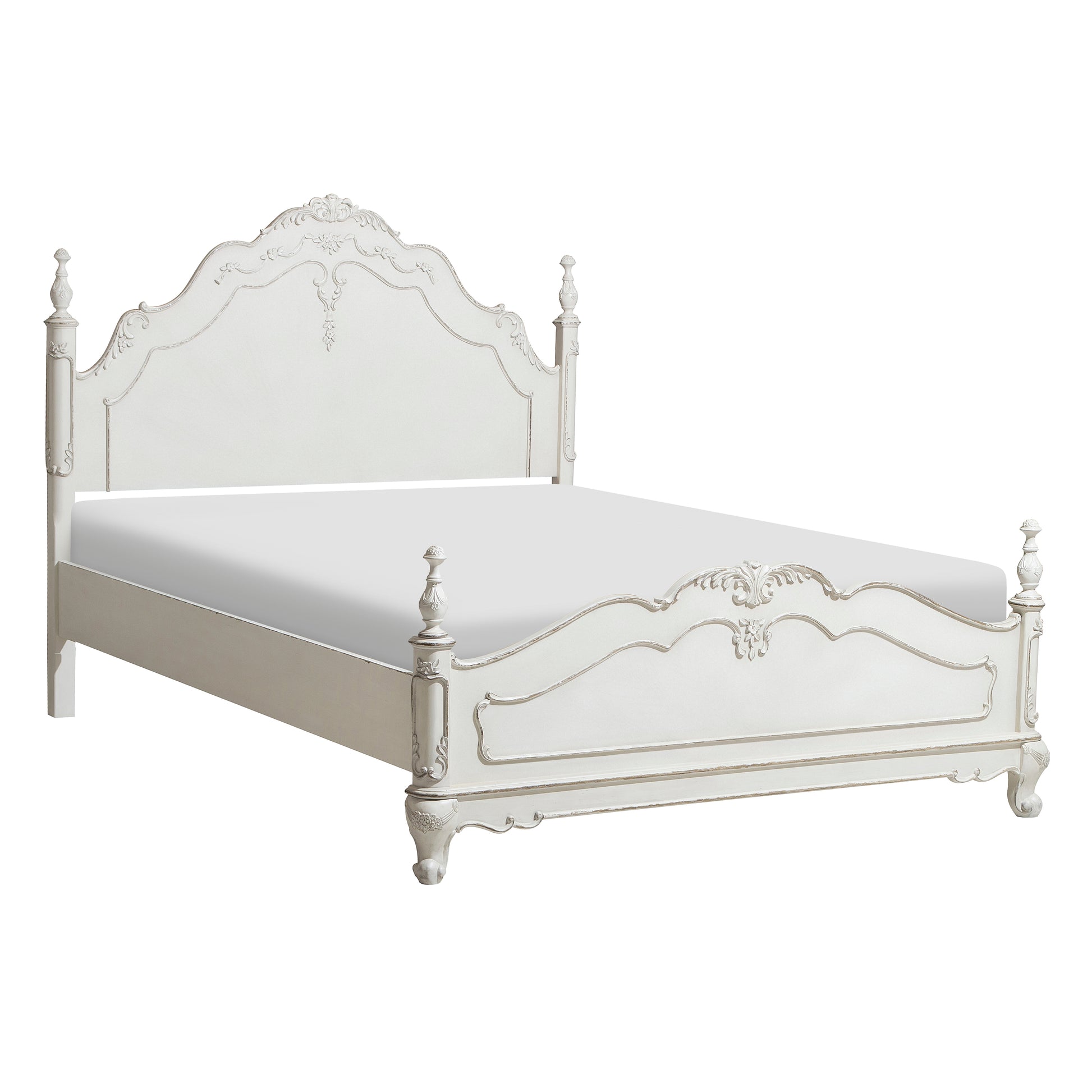 Ornate antique white wooden bed frame with carved details