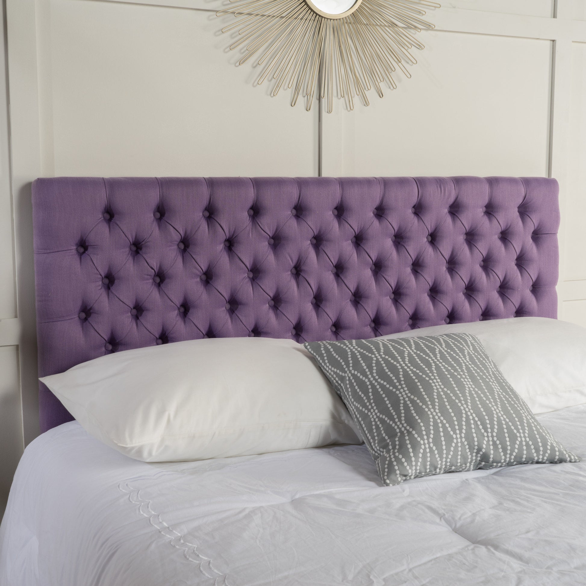 Plush purple velvet tufted headboard with button detailing