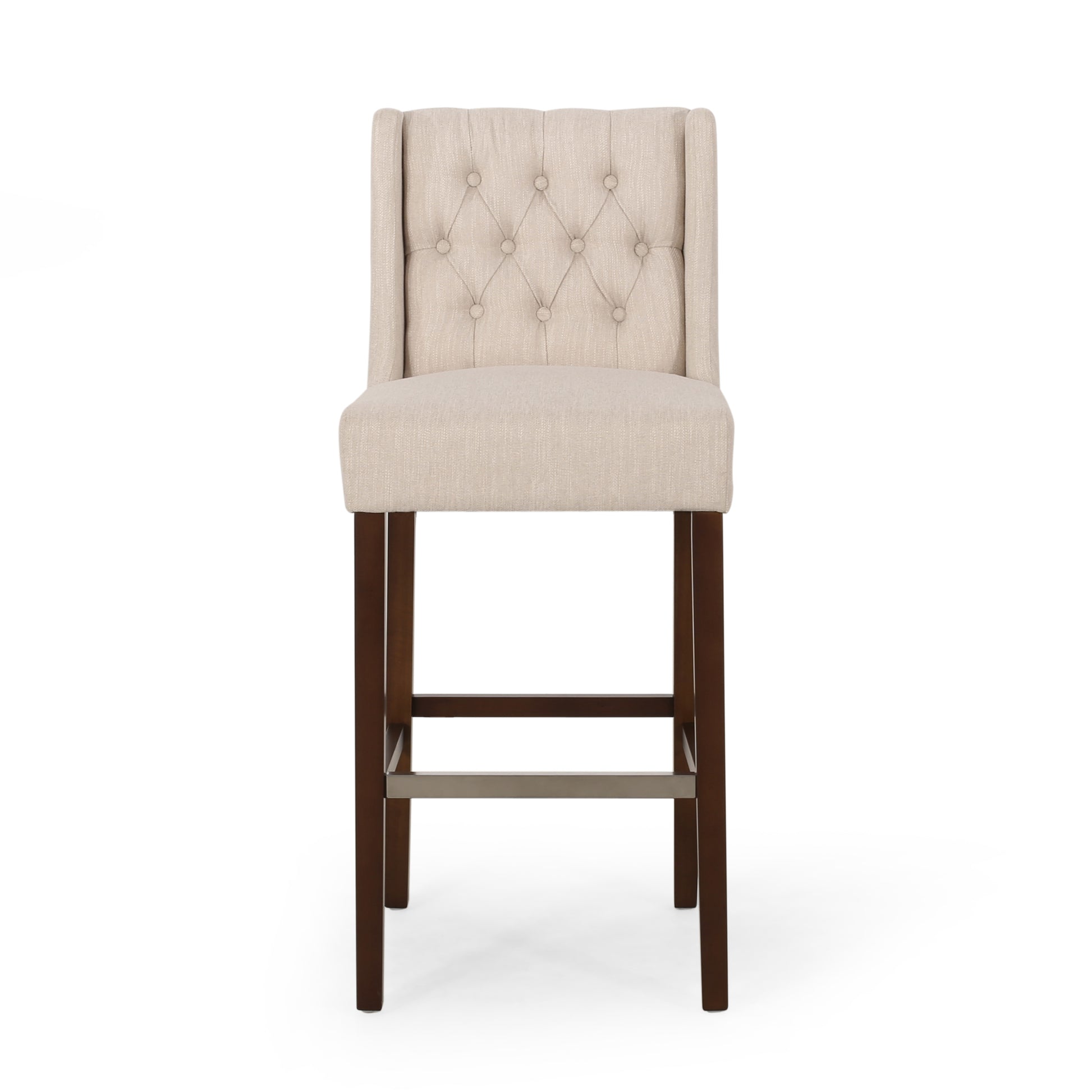 Beige upholstered tufted back bar stool with dark wood legs and footrest