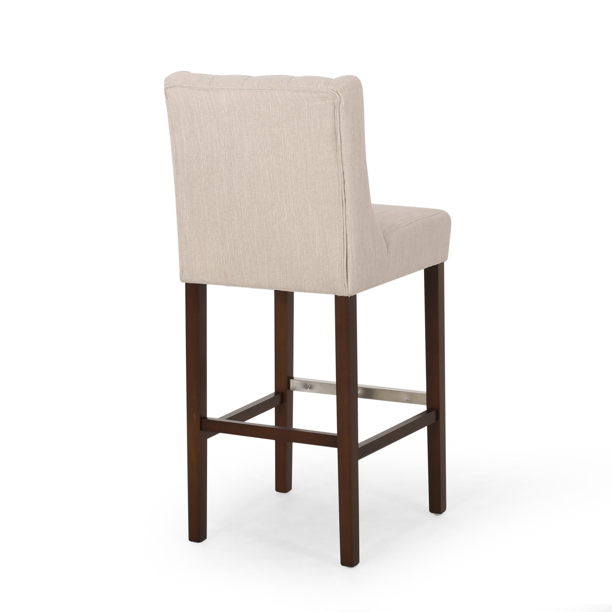Beige upholstered bar stool with dark wood legs and a tufted back