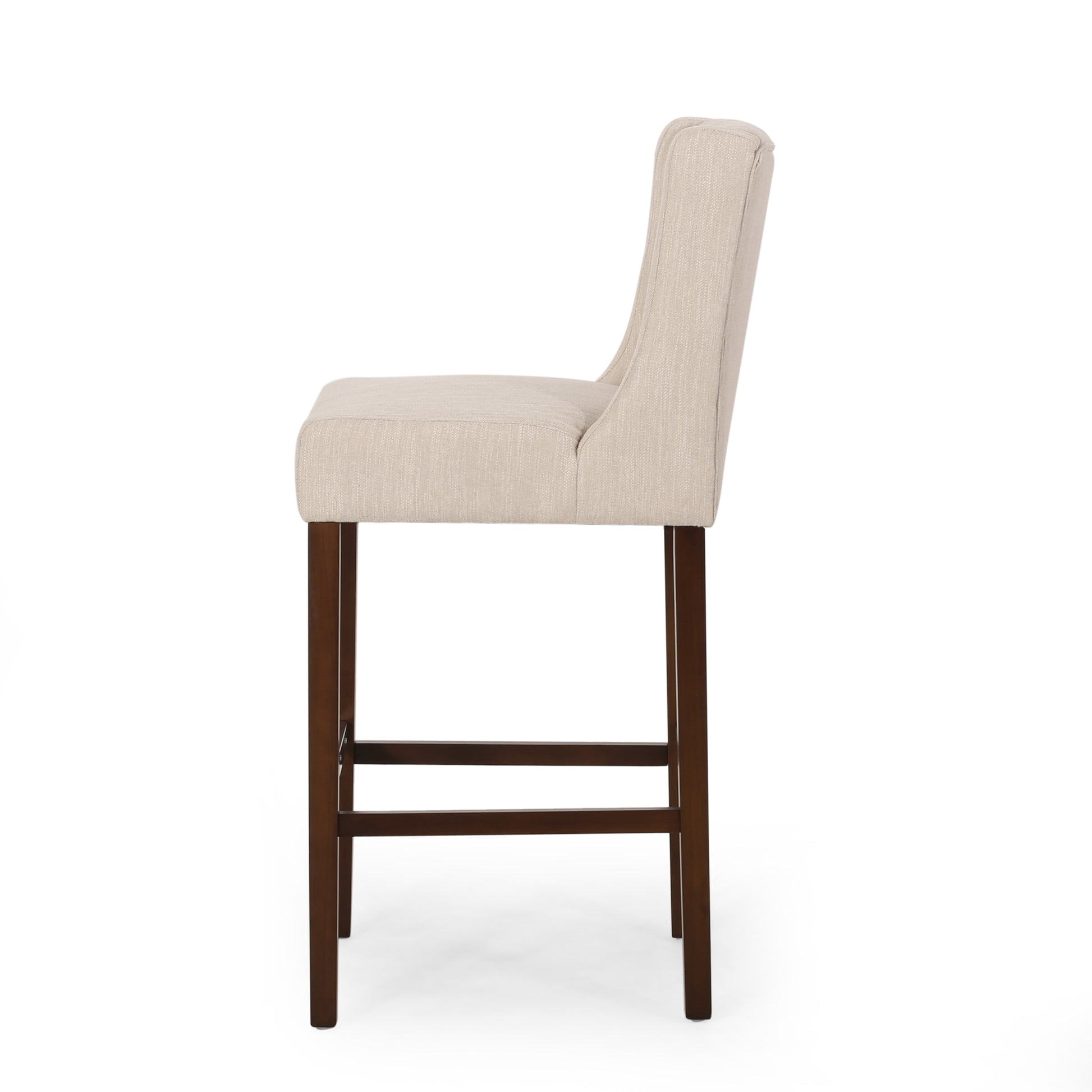 Beige fabric bar stool with tufted back and dark wood legs