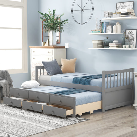 Gray wooden daybed with pullout trundle and storage drawers