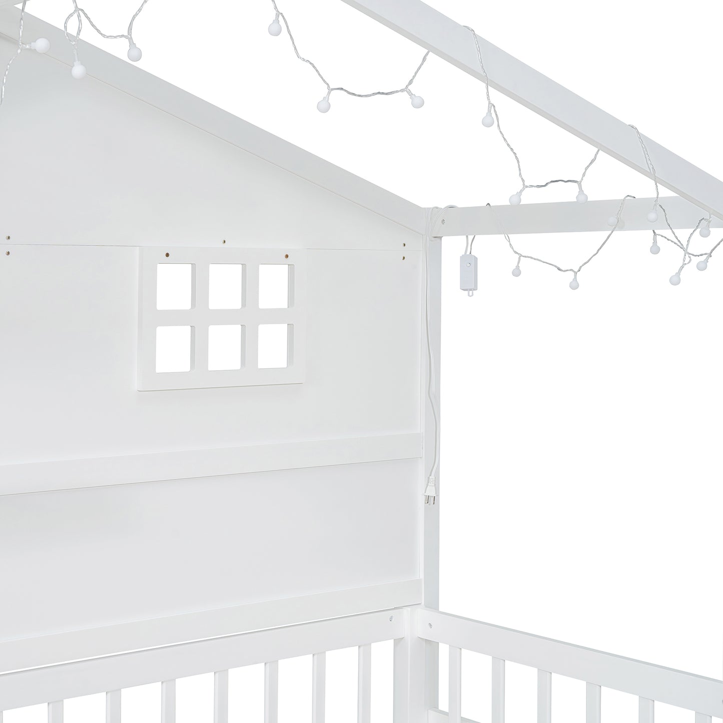White wooden house bed frame with playful string lights and window detail