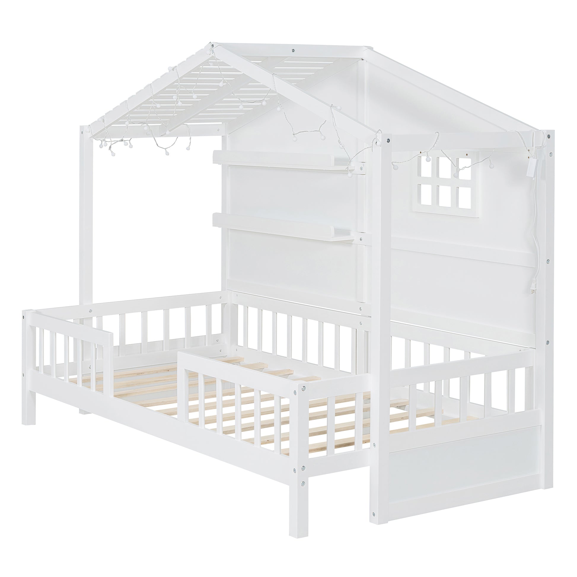 White wooden house bed with fairy lights and safety rails for childrens room