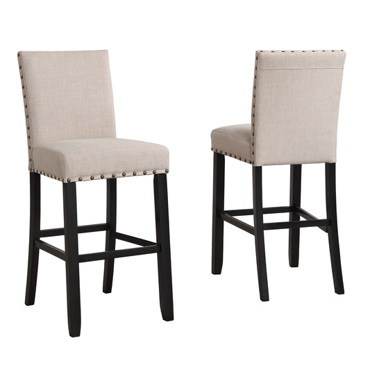Beige linen bar stool with nailhead trim and black wooden legs