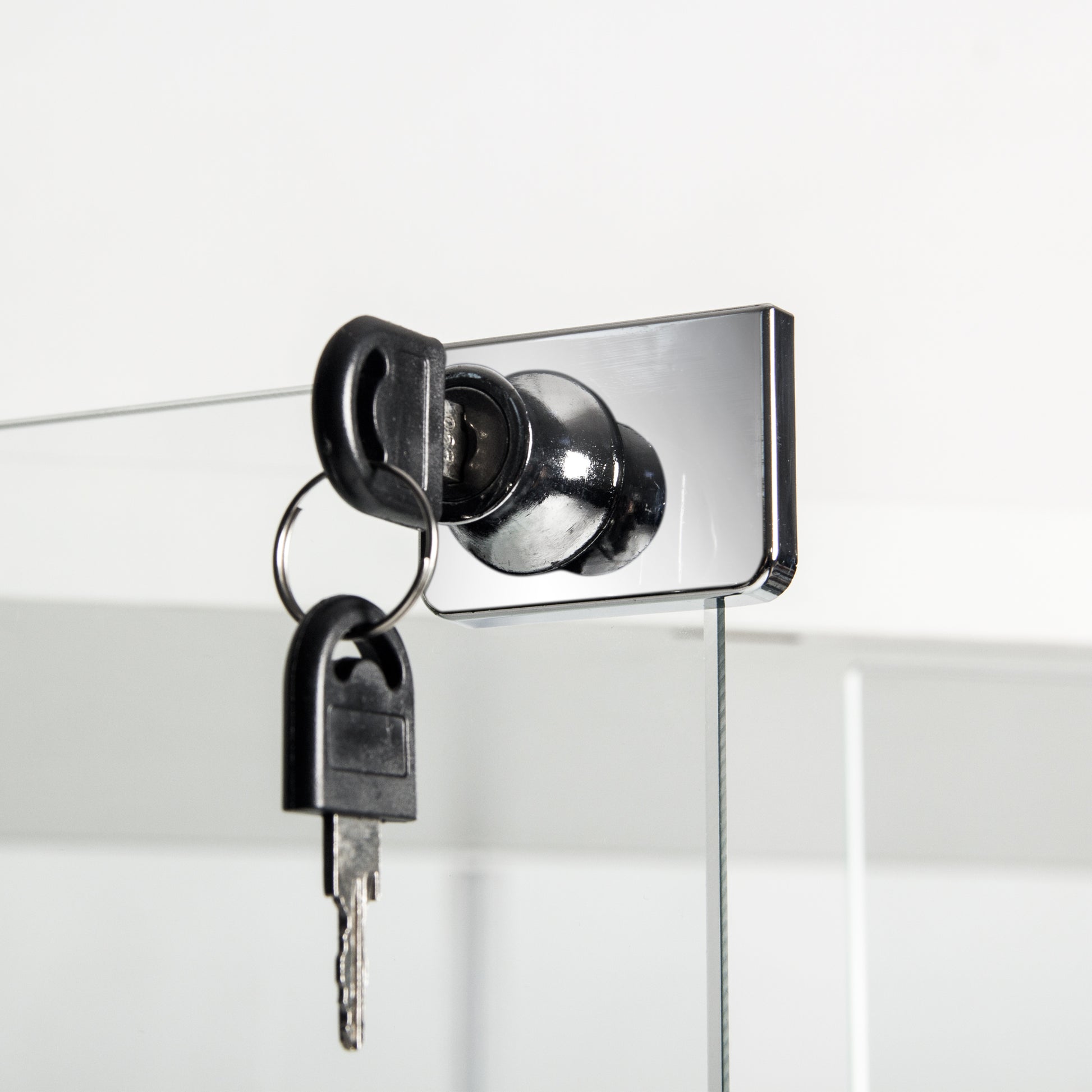 Chrome cabinet lock with two black keys
