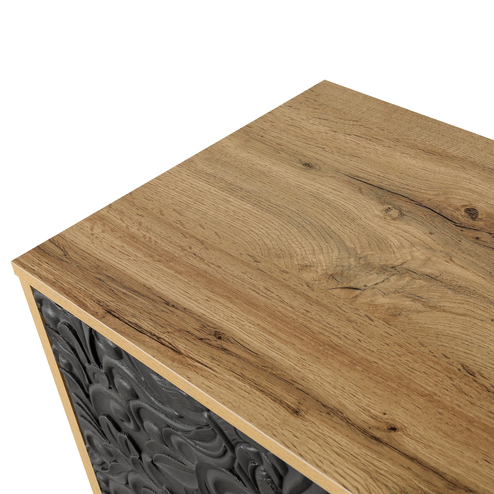 Ornate black embossed drawer front with natural wood grain top