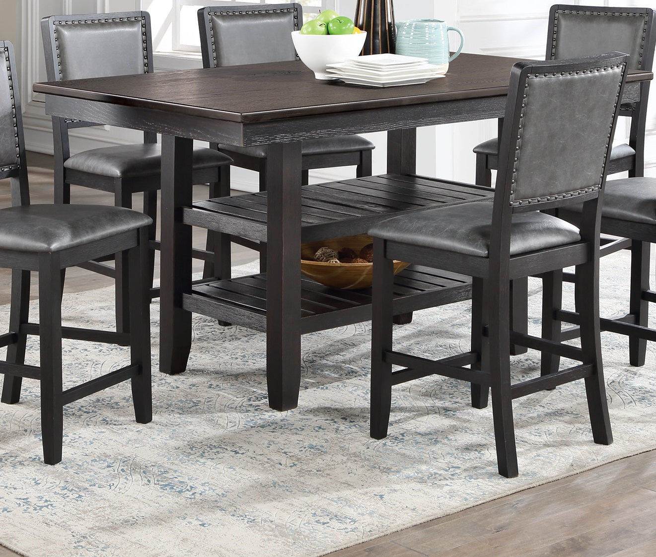 Dark wood bar height dining table set with tufted leatherette stools