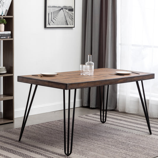 Rustic dark wood dining table with black hairpin legs set for two