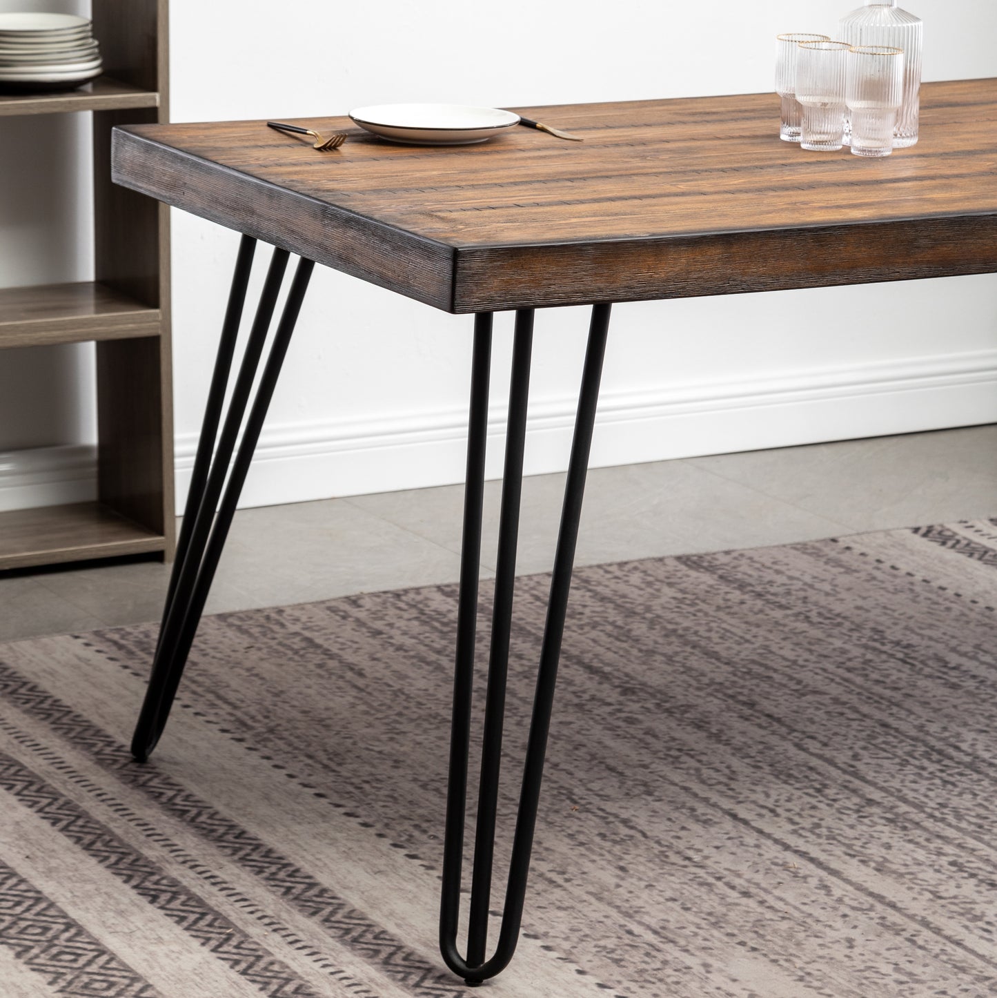 Rustic brown wood dining table with black hairpin legs