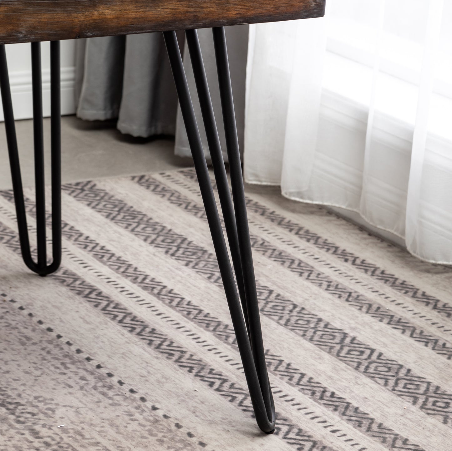 Rustic wood desk with black hairpin legs