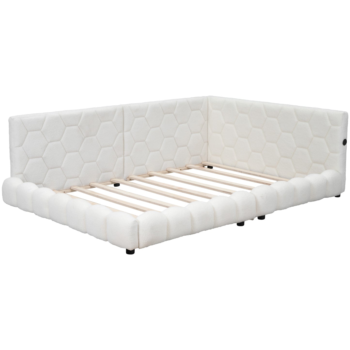 White upholstered platform bed with honeycomb tufting and rounded sides