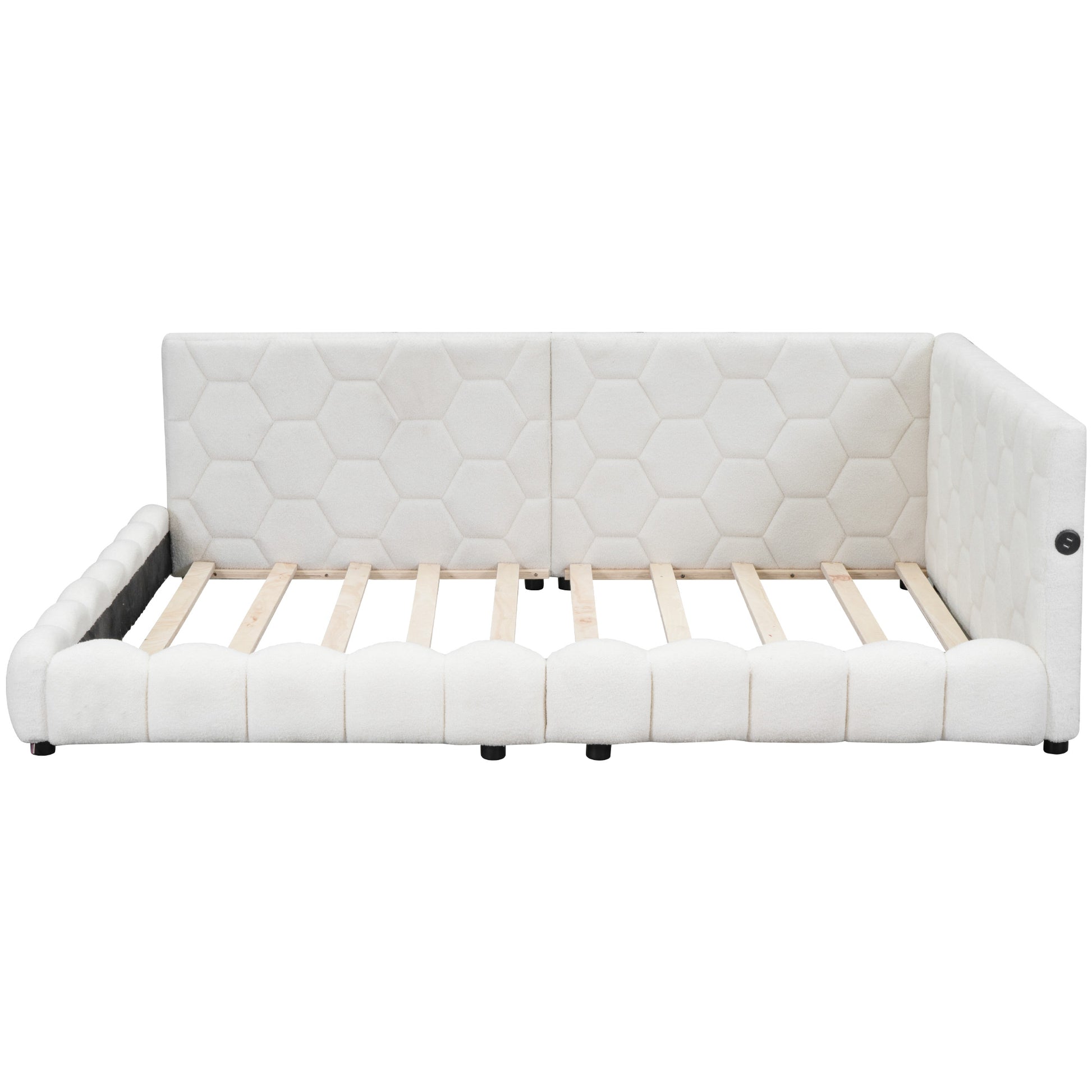 White upholstered daybed with hexagonal pattern