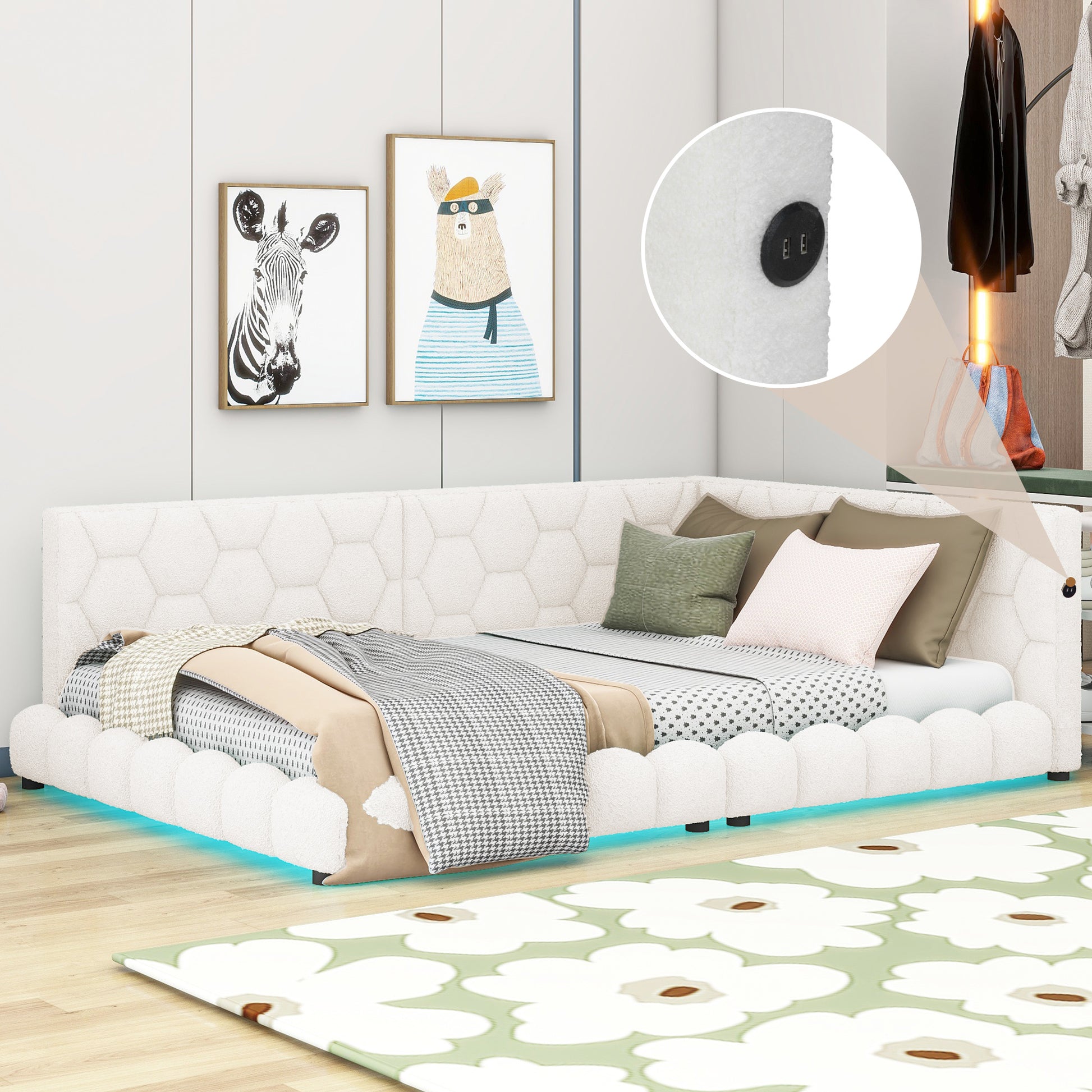 White boucle upholstered daybed with hexagonal pattern headboard and LED underlighting