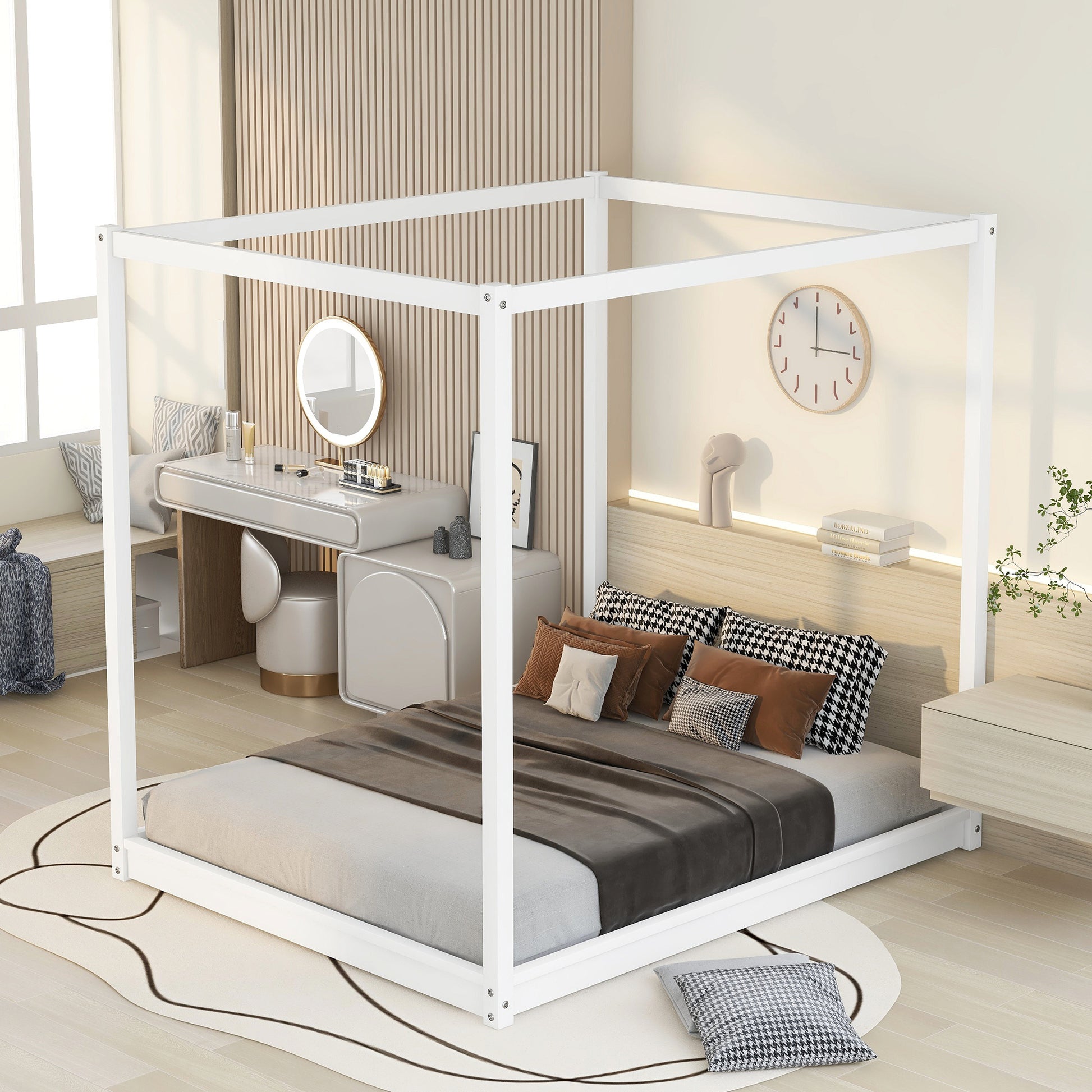 White metal canopy bed frame with pillows and bedding