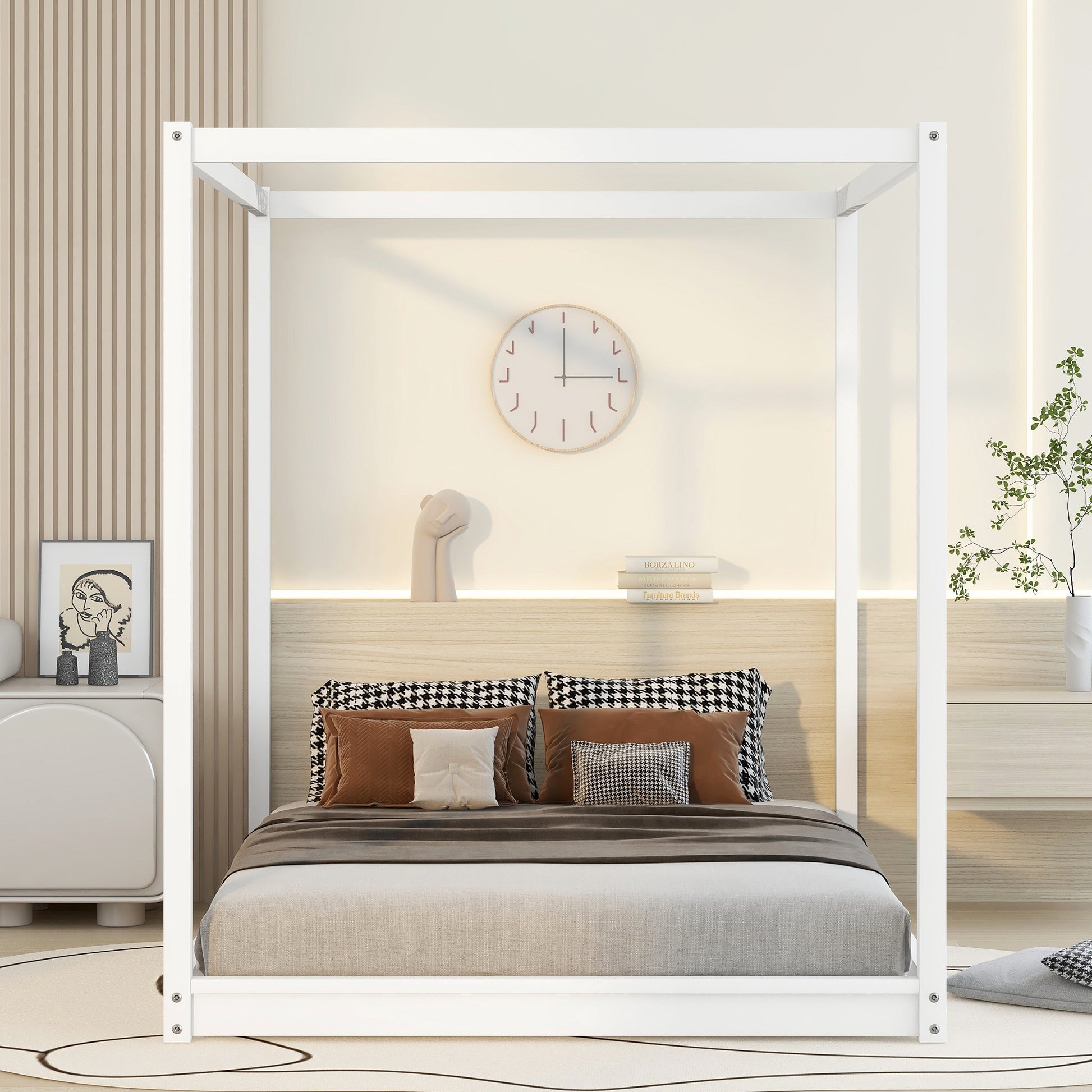 White modern canopy bed frame with plush bedding