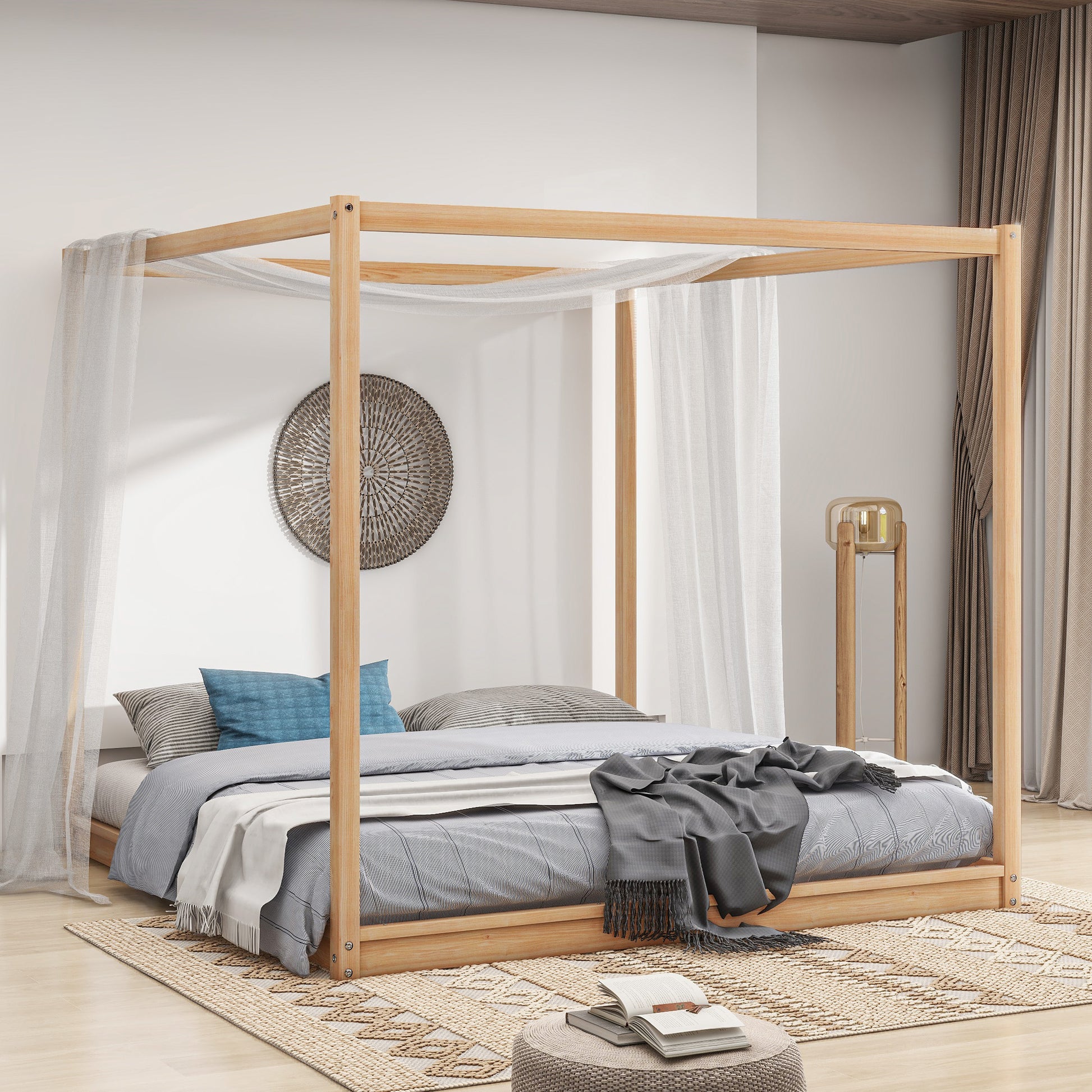 Natural wood fourposter bed frame with sheer drapes