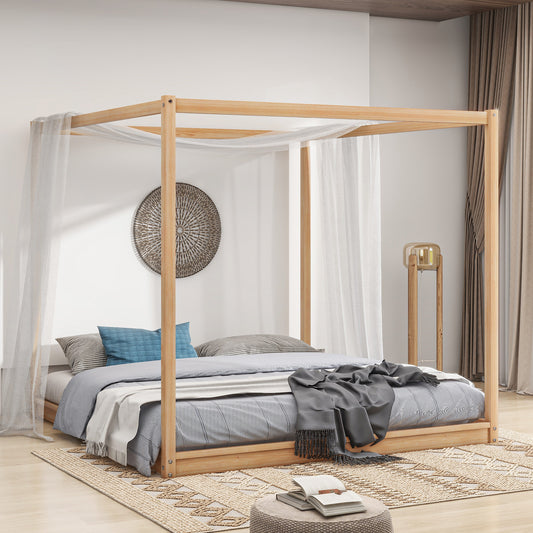 Natural wood fourposter bed frame with sheer drapes