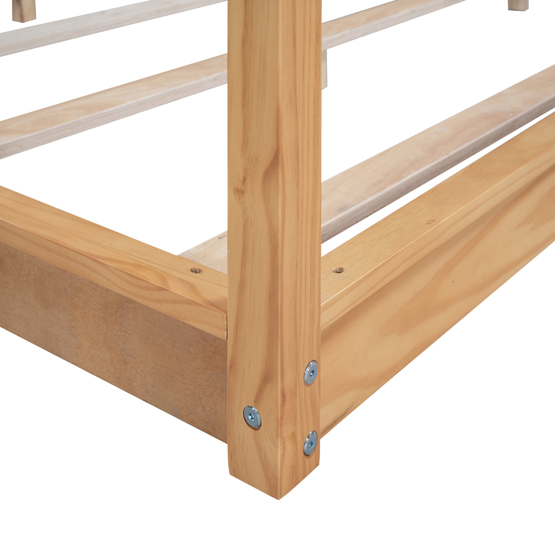 Natural pine wood bed frame corner detail with visible screws