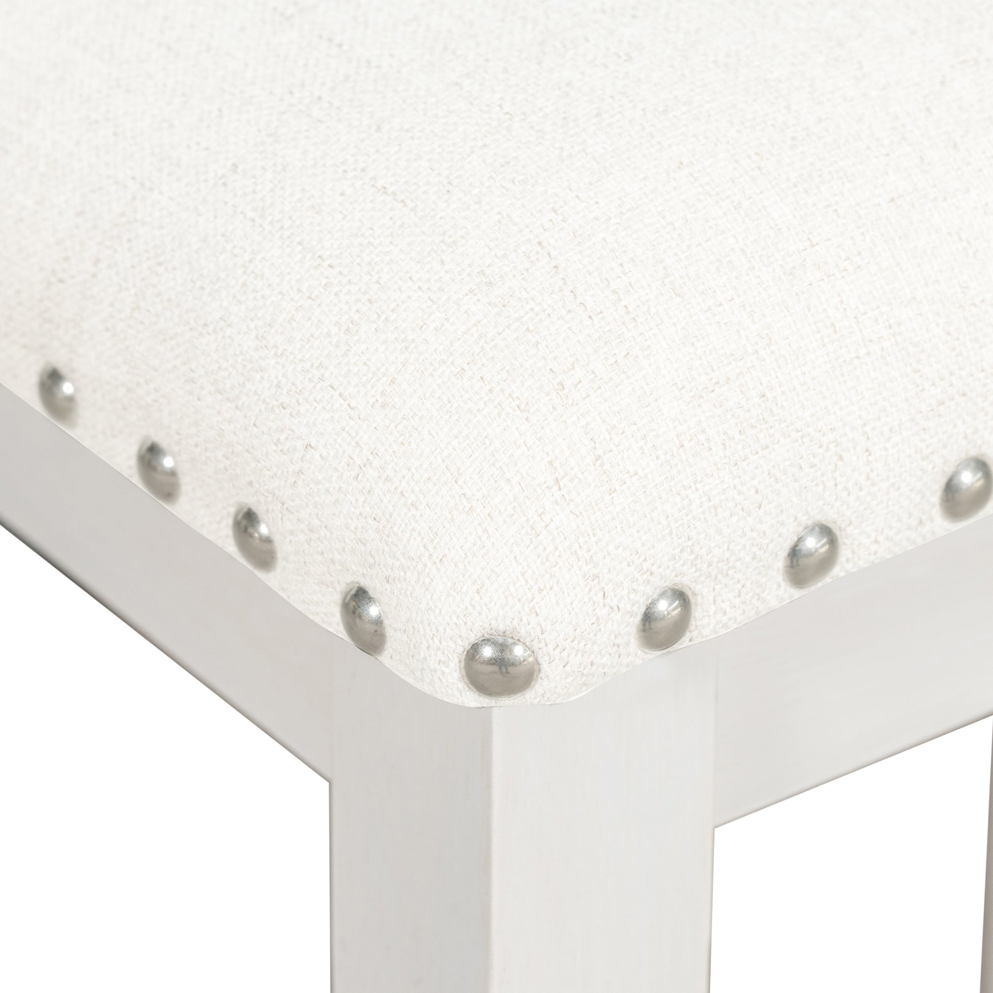 White linen stool cushion with silver nailhead trim