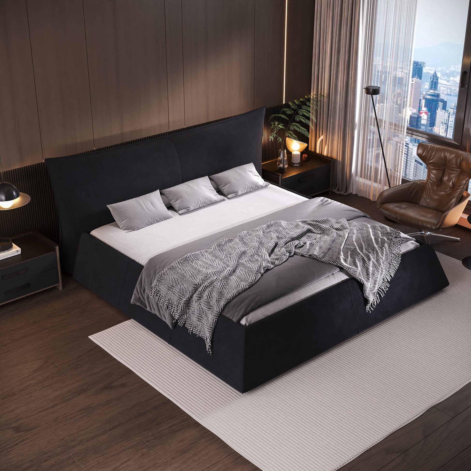 Dark grey fabric upholstered platform bed with three plush pillows