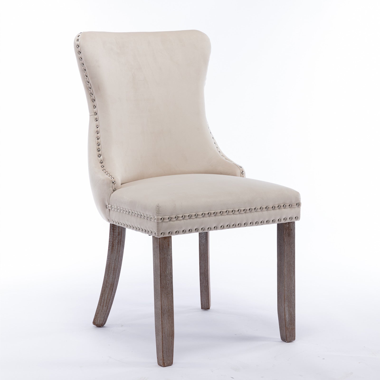 Cream velvet dining chair with nailhead trim and wooden legs