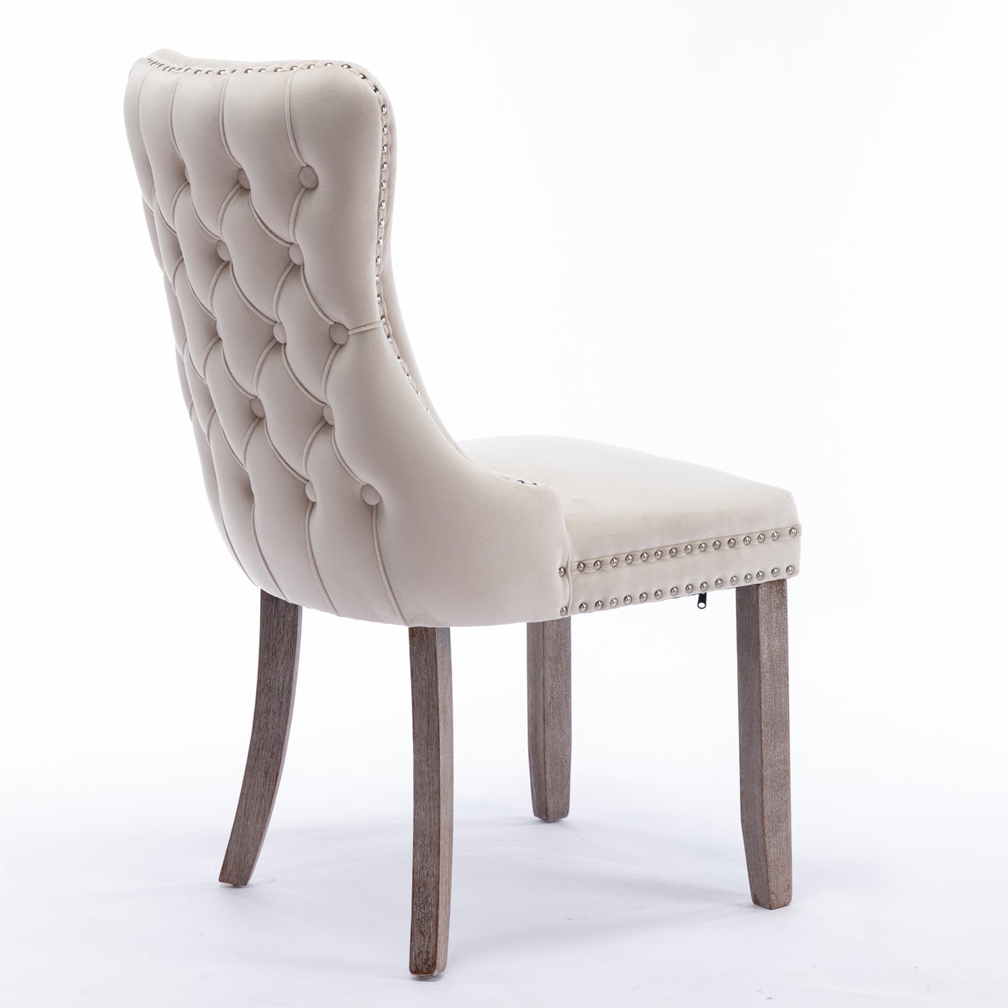 Elegant tufted cream velvet dining chair with silver nailhead trim