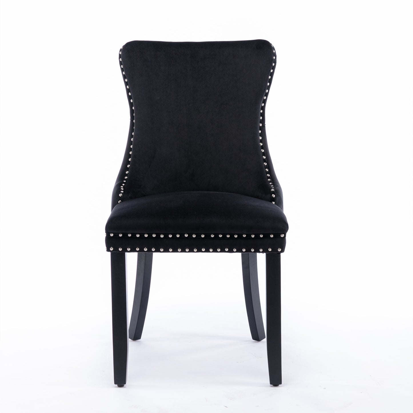 Black velvet dining chair with silver nailhead trim and dark wood legs