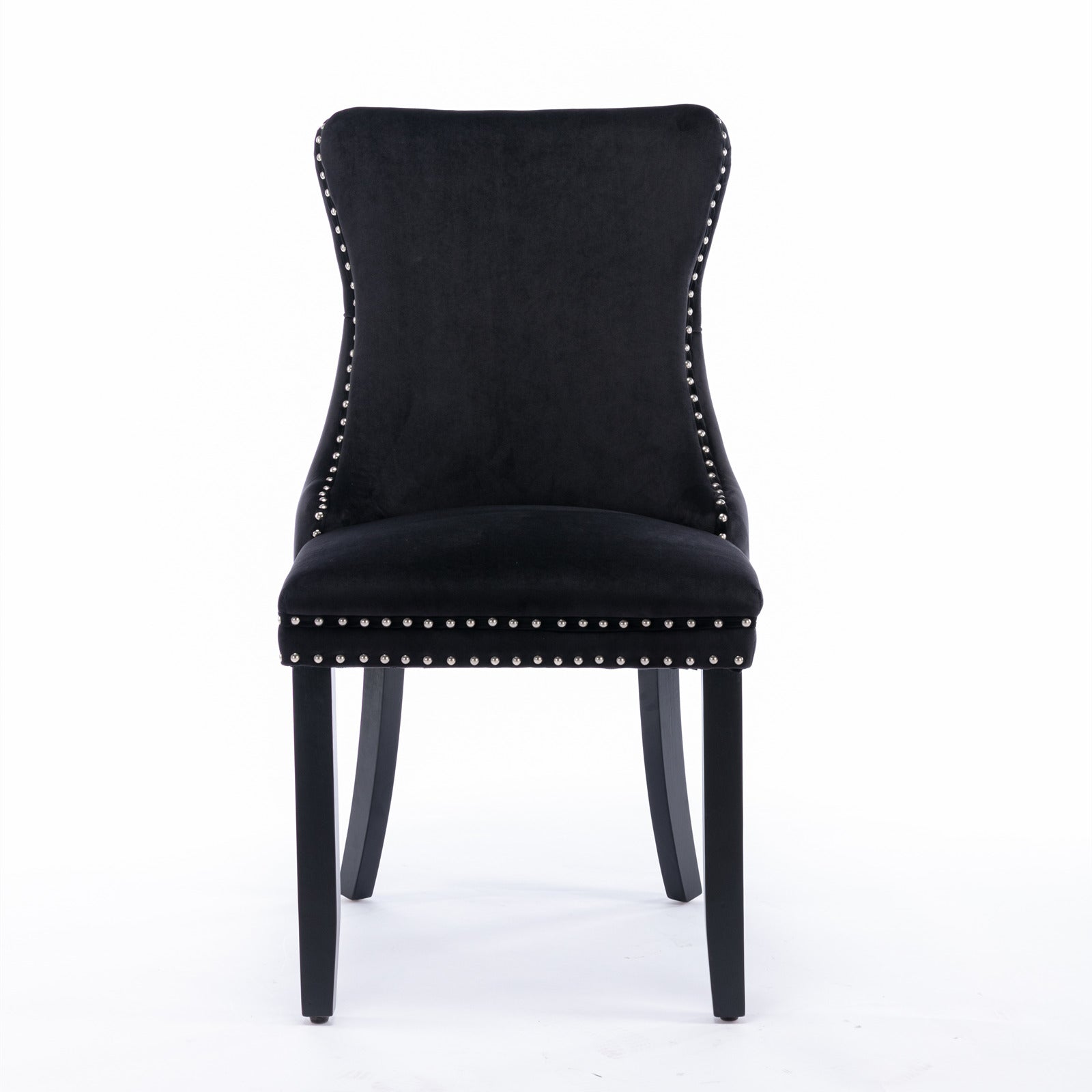 Black velvet dining chair with silver nailhead trim and dark wood legs