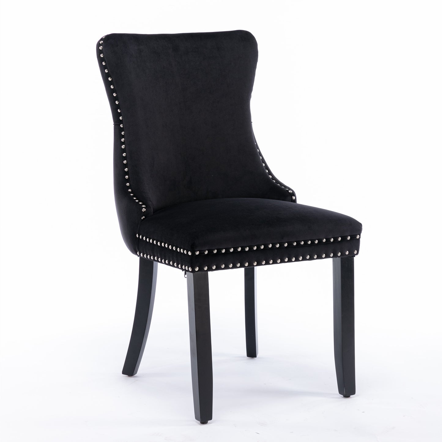 Black velvet dining chair with silver nailhead trim and carved wooden legs