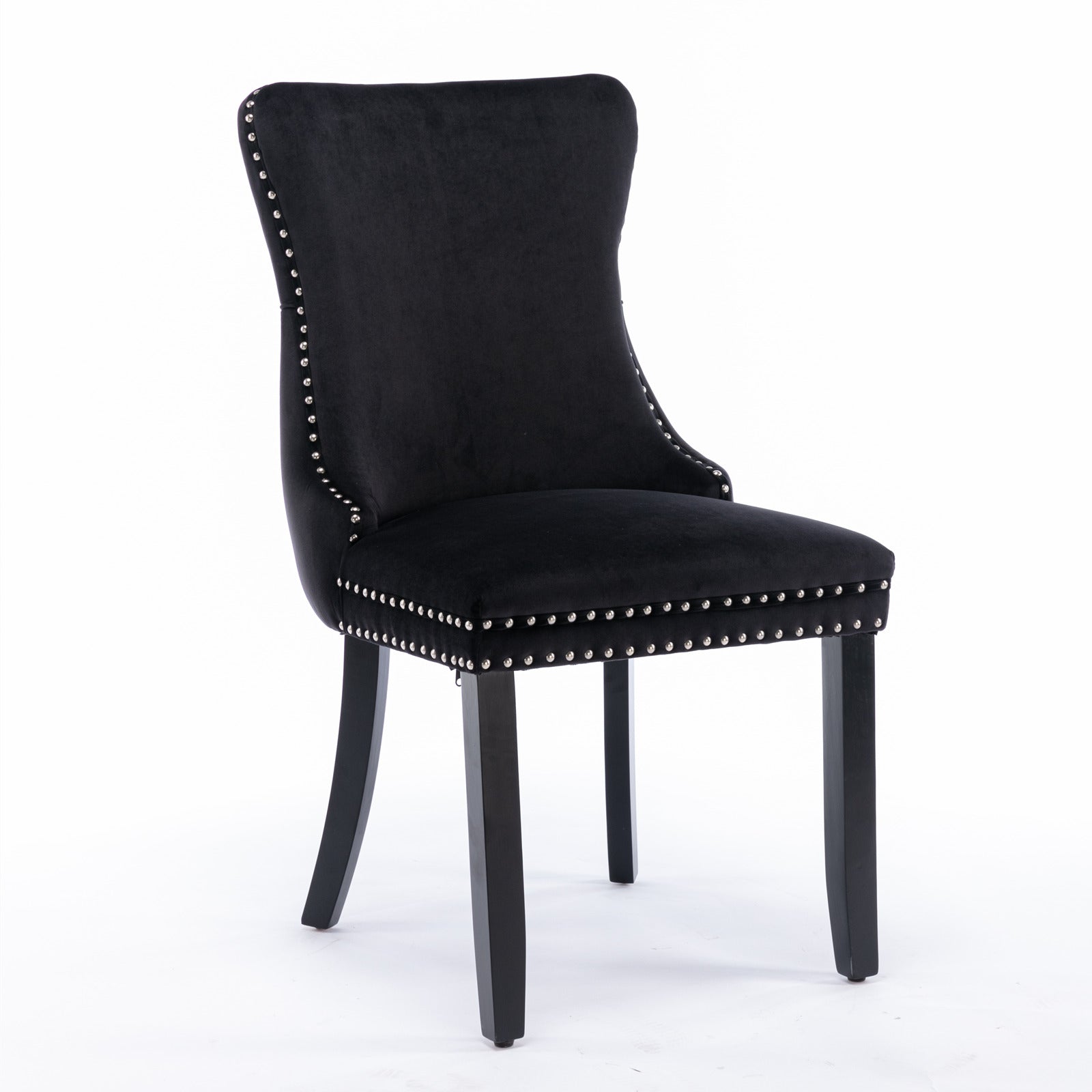 Black velvet dining chair with silver nailhead trim and carved wooden legs