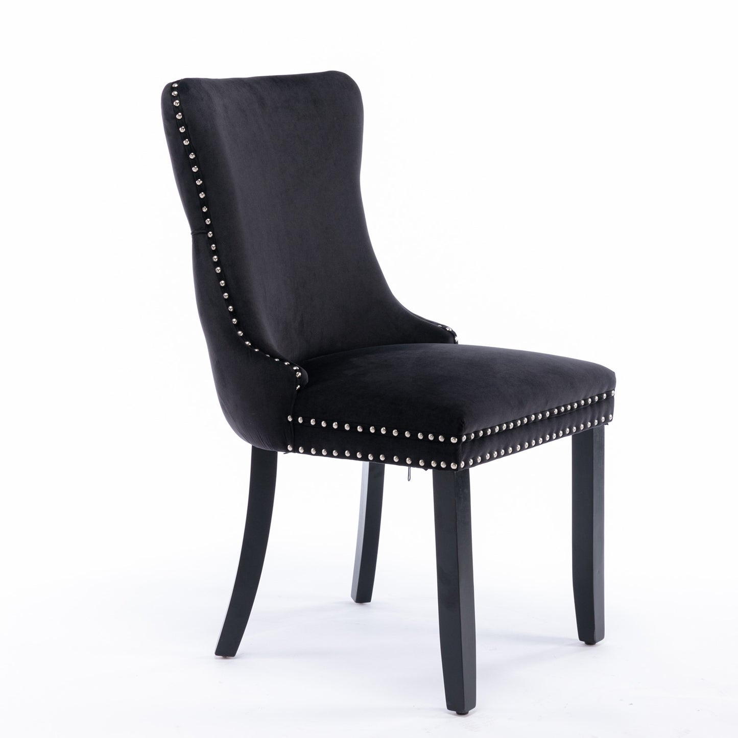 Black velvet dining chair with silver nailhead trim and dark wood legs