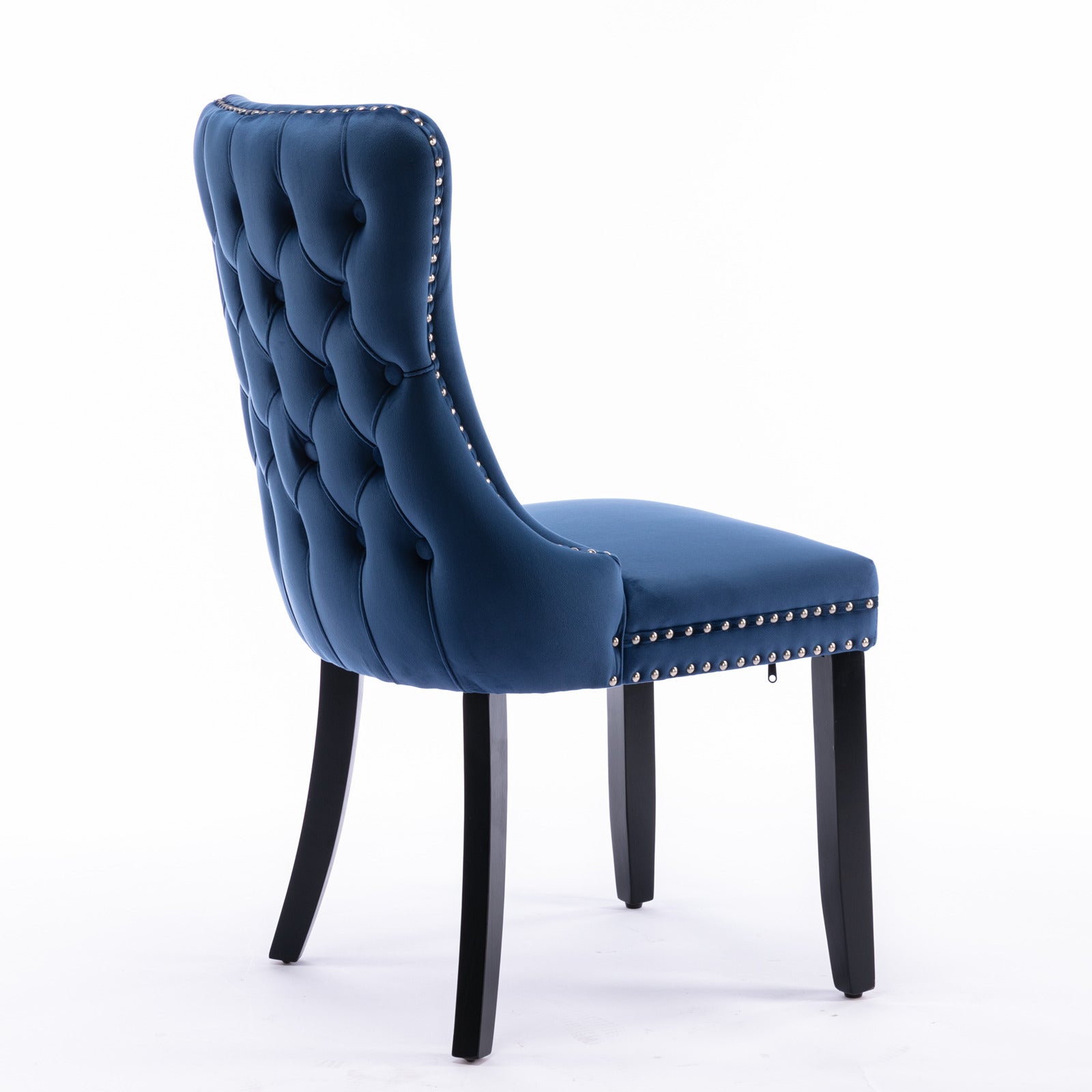 Navy velvet tufted dining chair with silver nailhead trim