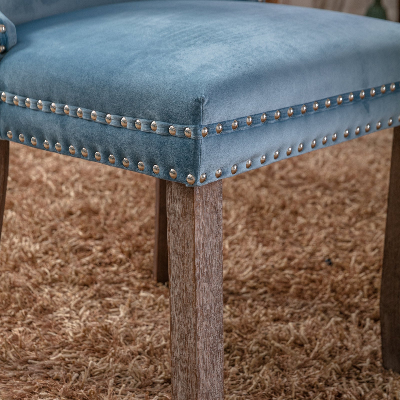 Blue velvet armchair seat with silver nailhead trim