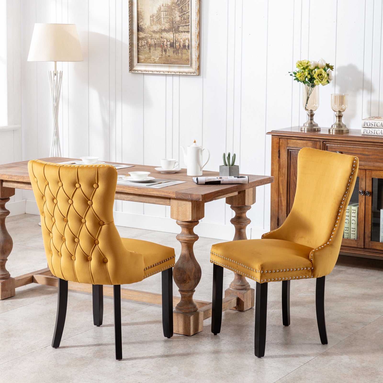 Tufted mustard velvet dining chair with nailhead trim