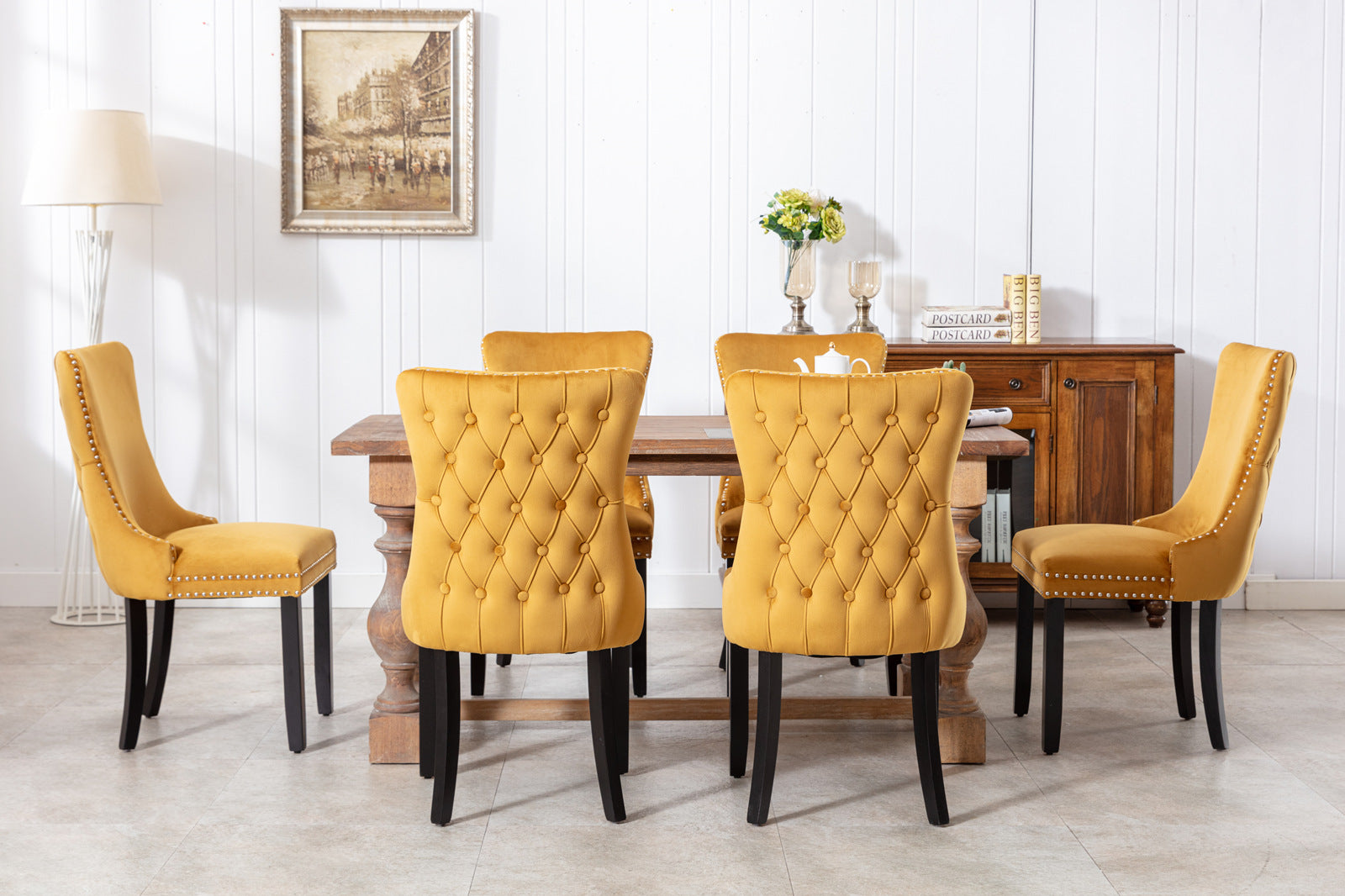 Tufted mustard velvet dining chair with silver nailhead trim