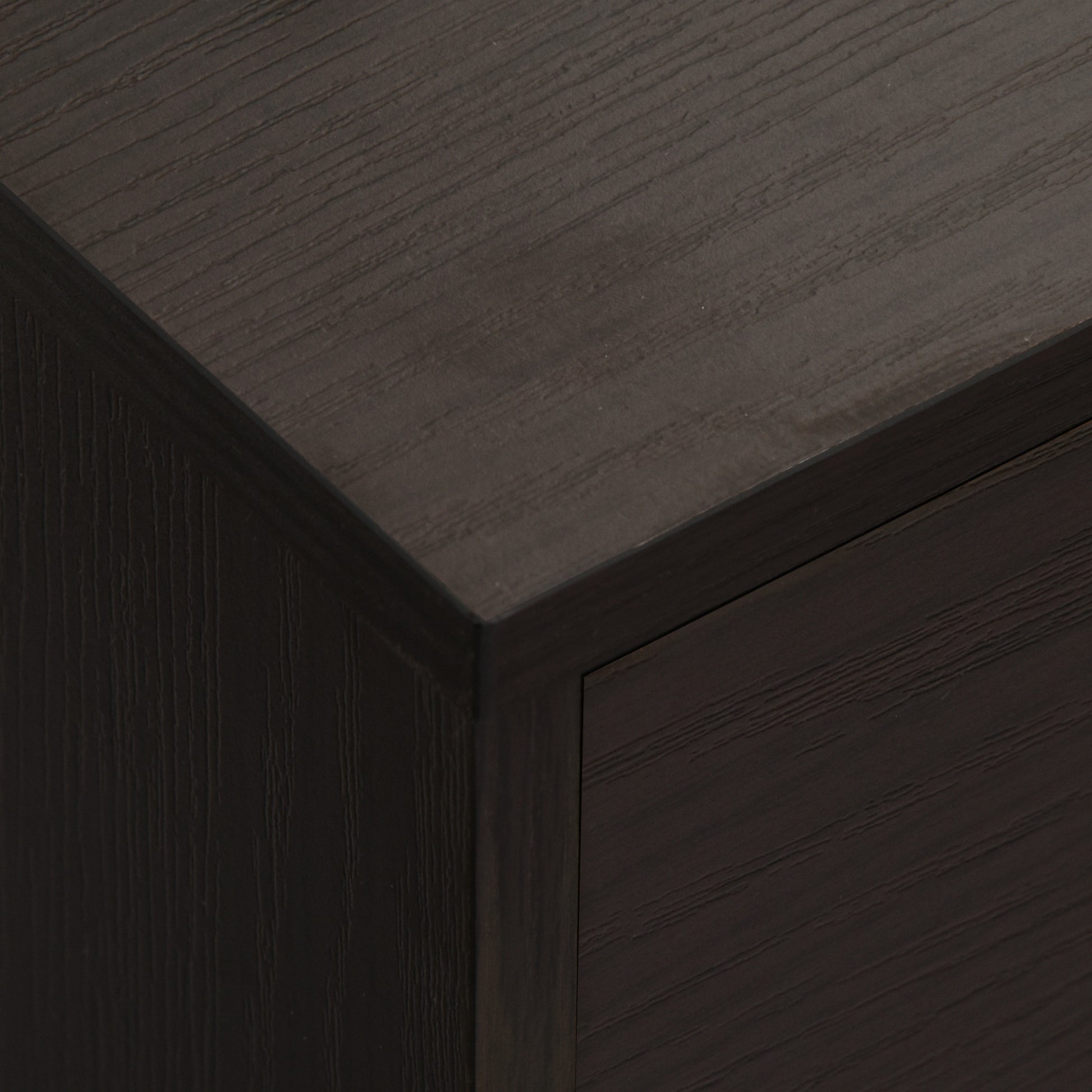 Dark oak veneer dresser detail with clean lines