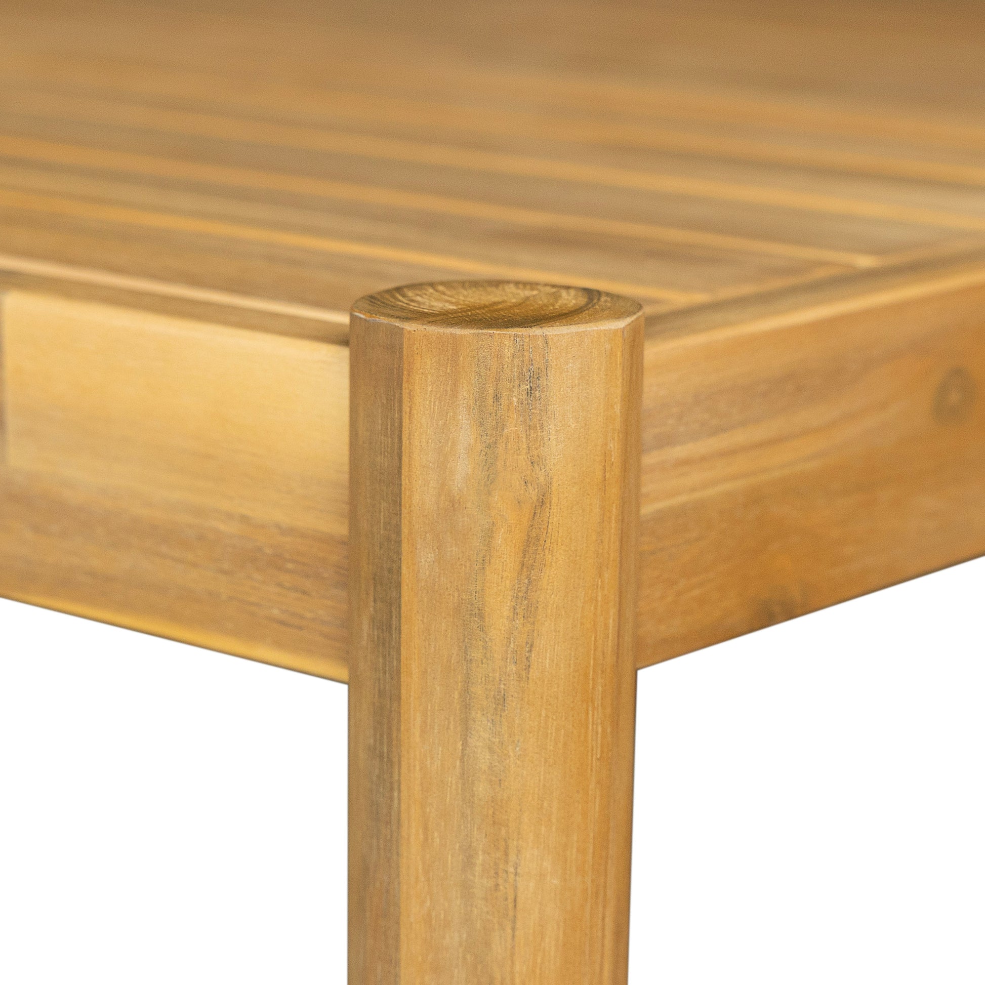 Natural wood outdoor table leg detail with visible grain