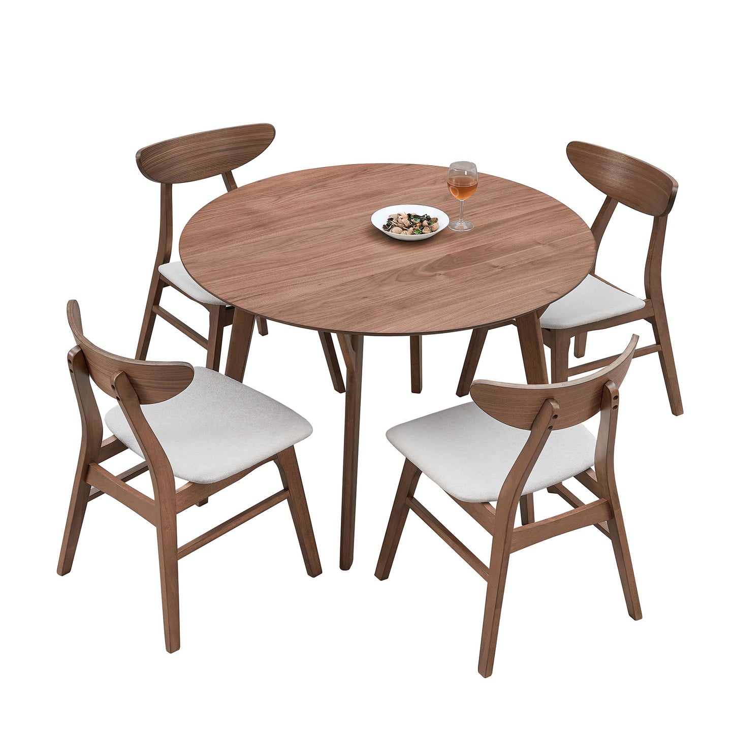 Round walnut dining table with four upholstered chairs