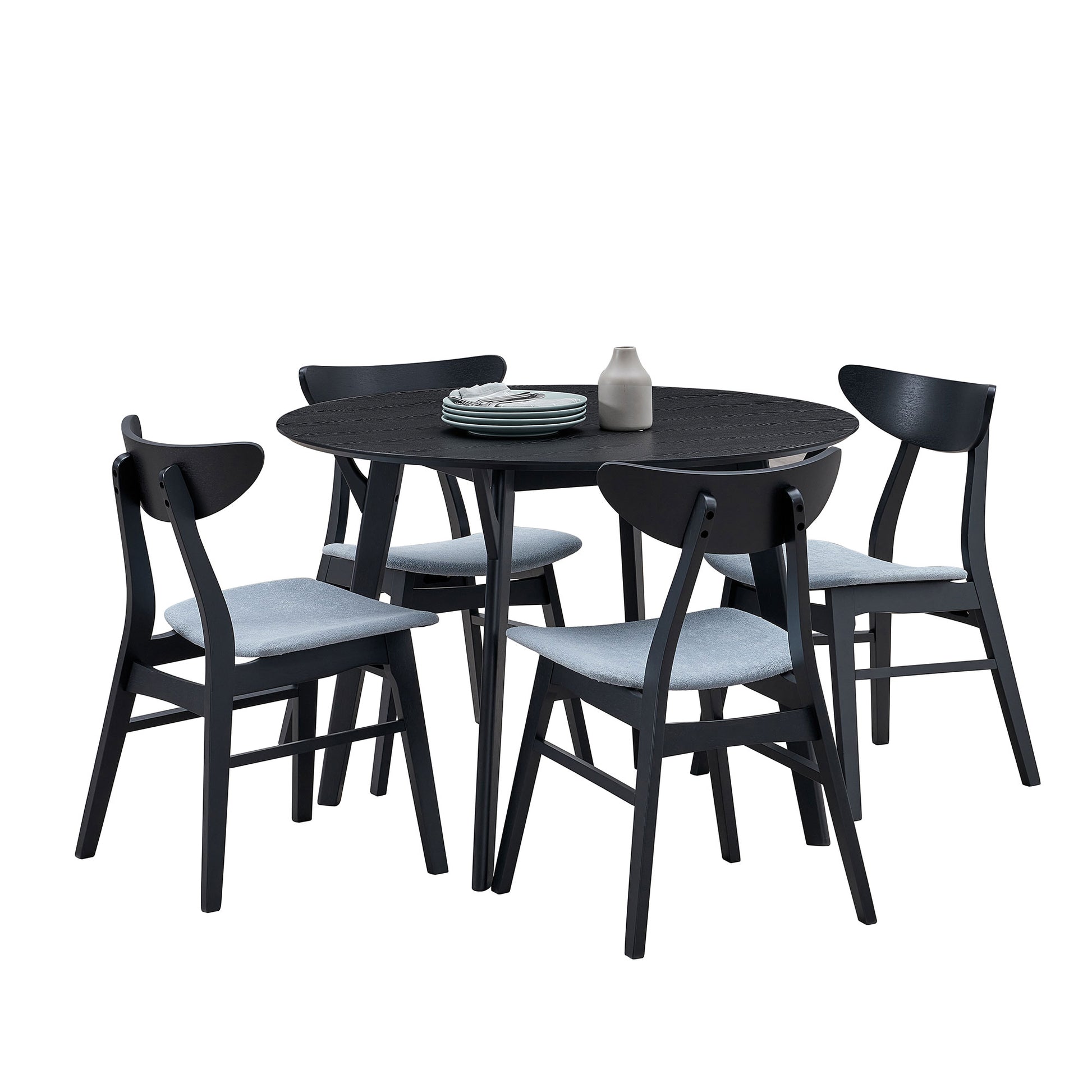 Black wooden dining table with four chairs