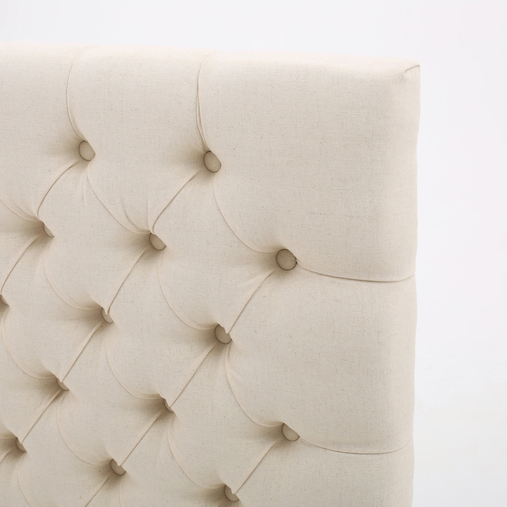 Cream linen tufted headboard with button detailing