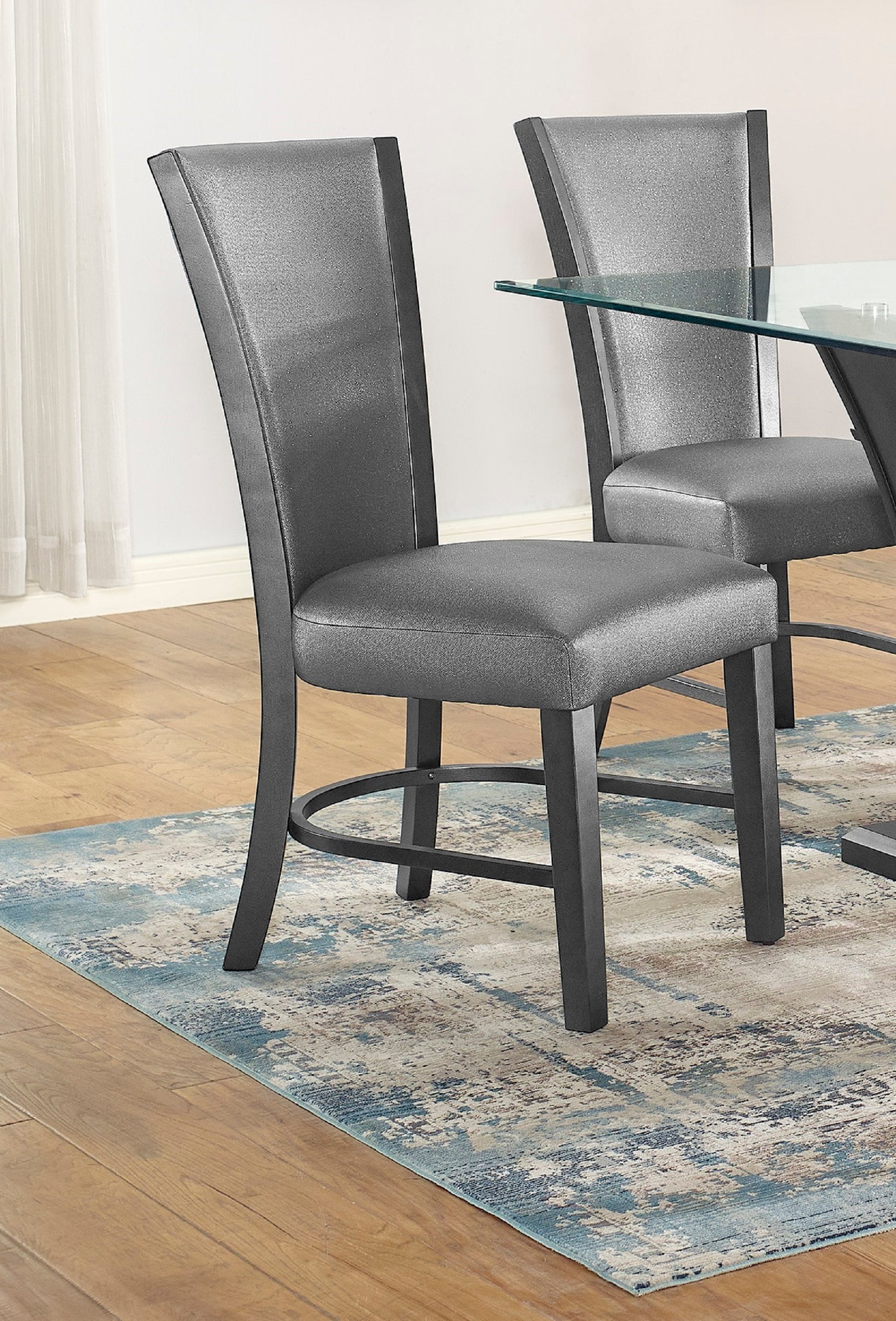 Modern grey faux leather dining chair with metal legs