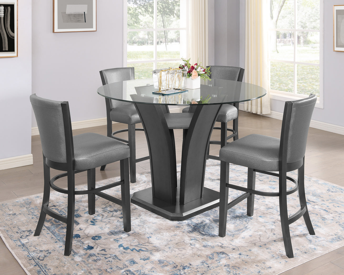 Glass top bar table with four grey leatherette counter stools