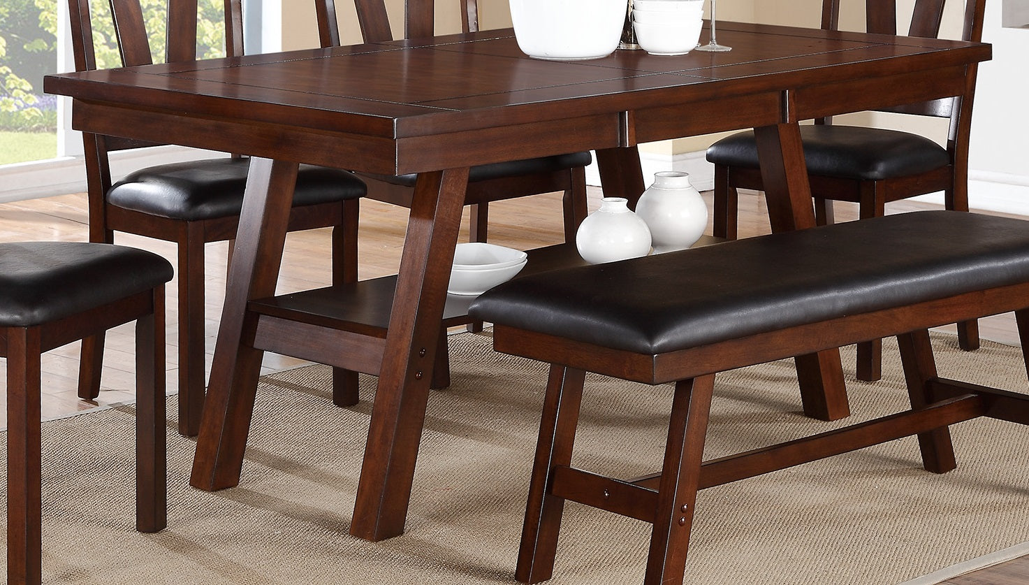 Dark wood dining table with brown faux leather seating and chairs