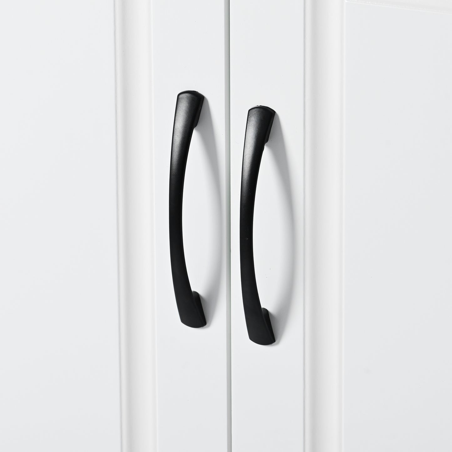 Two black modern curved cabinet door handles