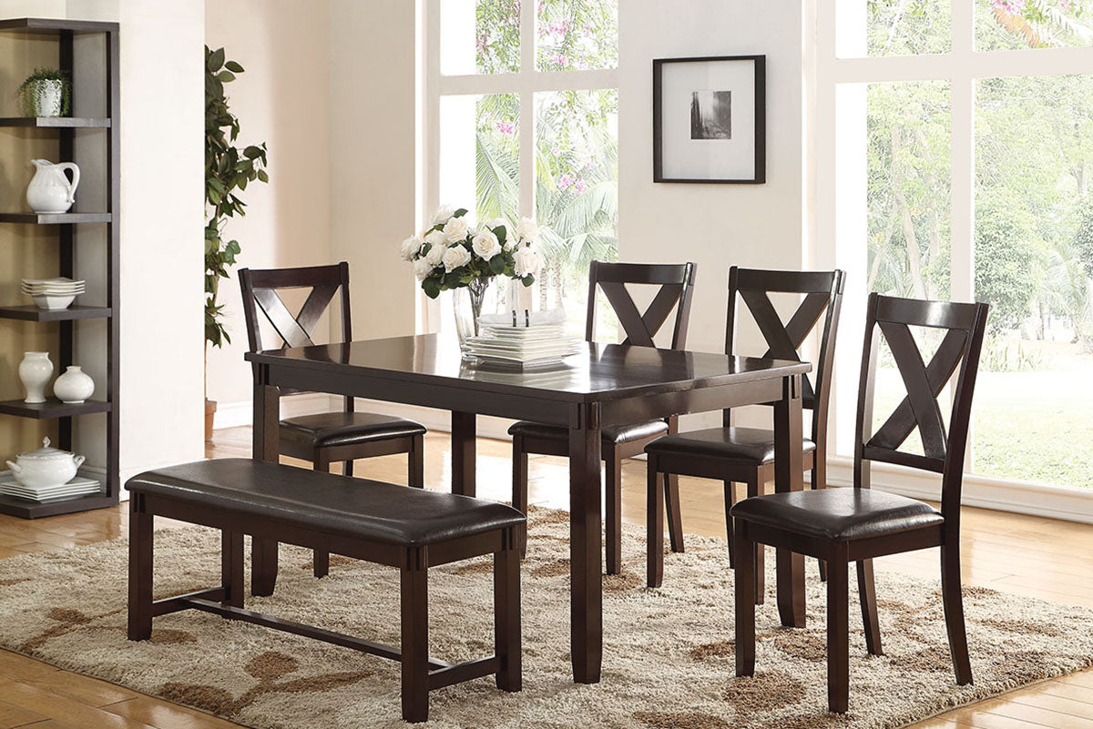 Dark wood dining table and chairs set with plush rug