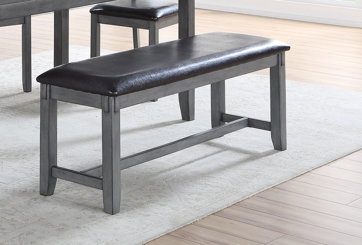 Gray wooden dining bench with dark faux leather seat