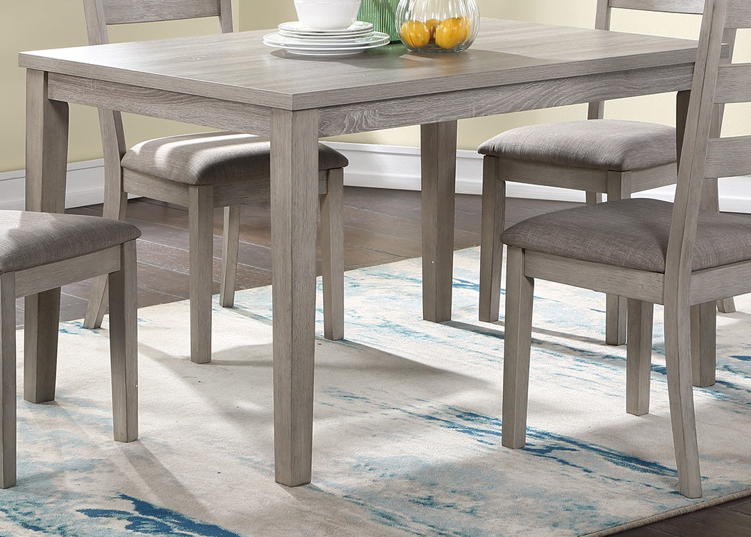 Grey wood dining table set with upholstered chairs